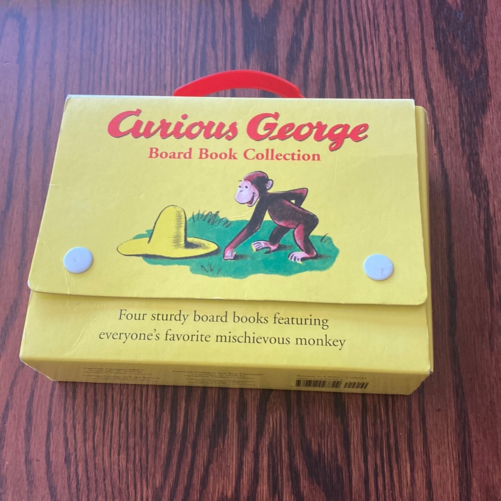 Four Curious George board books